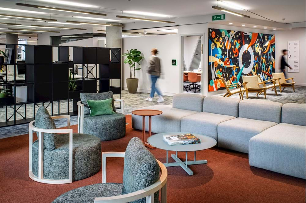 A soft seating break-out area in a contemporary workspace